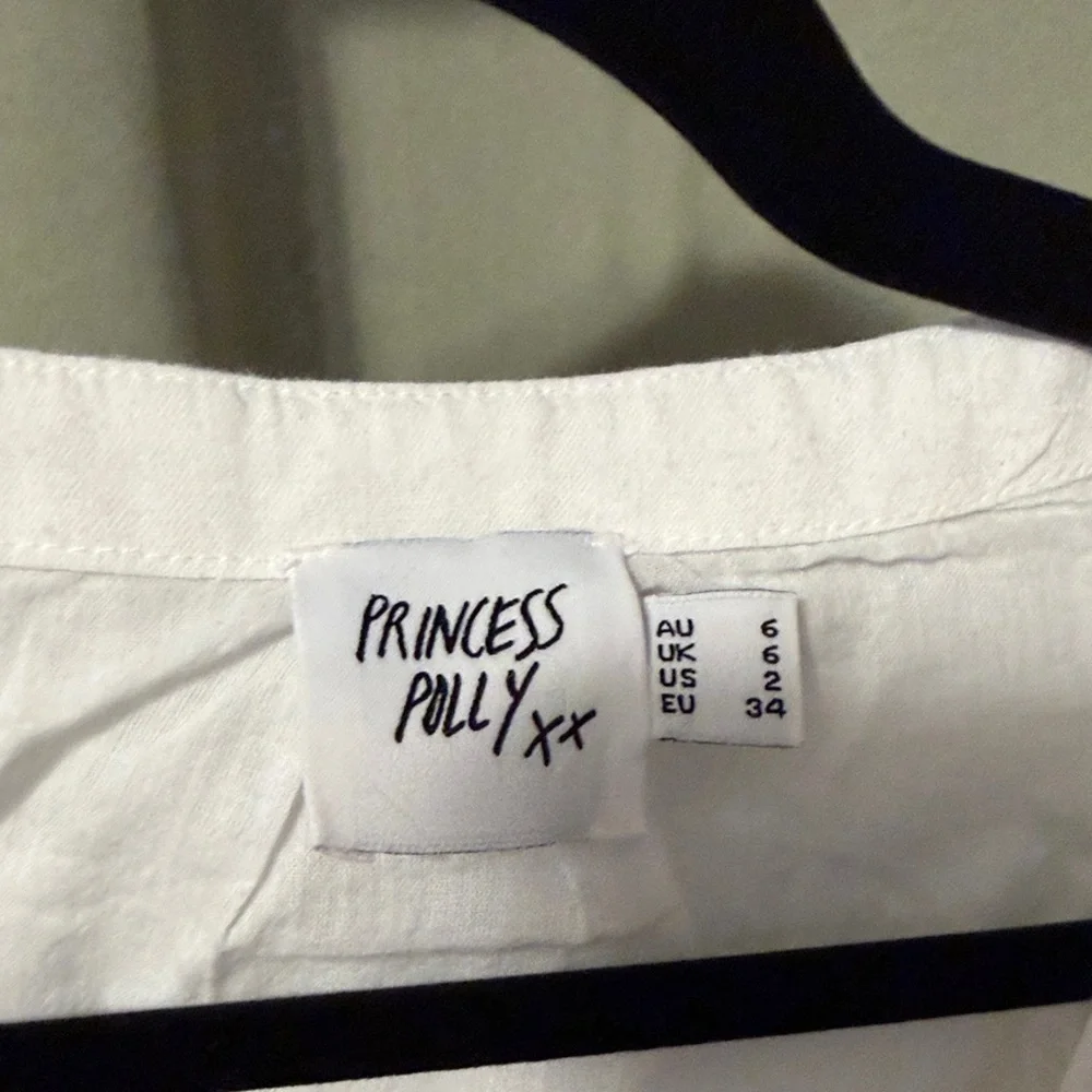 Princess Polly Cream Sleeveless Button-Up Blouse - Picture 2 of 2